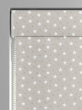 Roman blind with ditsy stars pattern in natural colour, imported from the UK