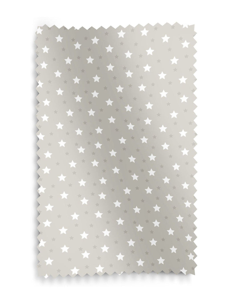 Roman blind with ditsy stars pattern in natural colour, imported from the UK