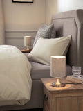 Brushed nickel Burford bedside table lamp with oatmeal shade, UK version