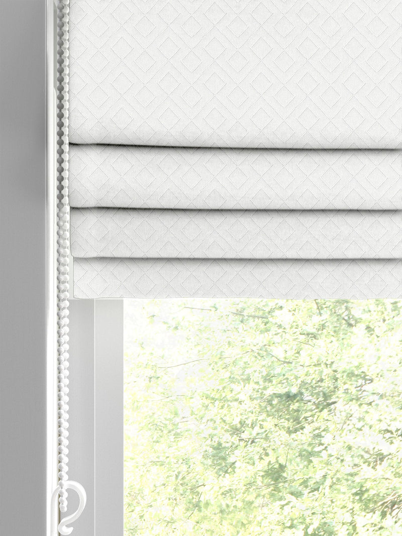 Cream Sicily roman blind with diamond pattern (British brand)