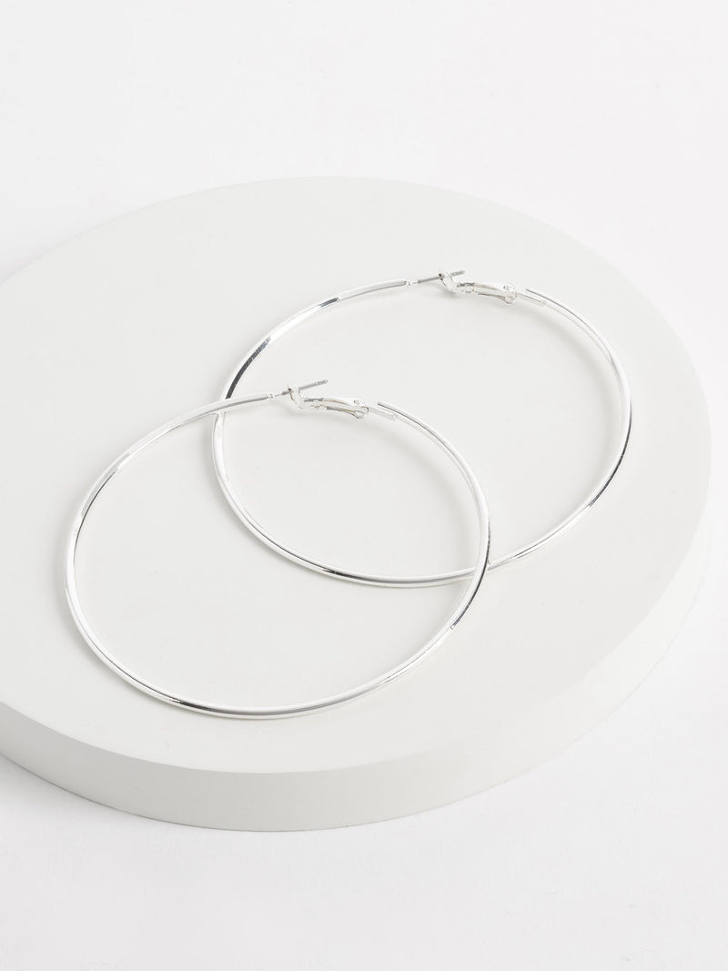 Silver tone oversized hoop earrings (British brand)