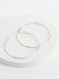 Silver tone oversized hoop earrings (British brand)