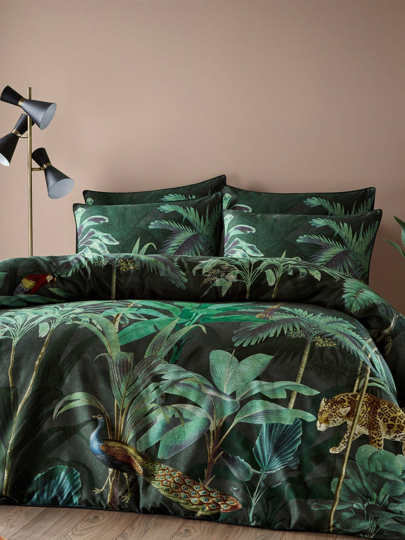 Riva Paoletti Green Siona Tropical reversible duvet cover and pillowcase set, imported from the UK