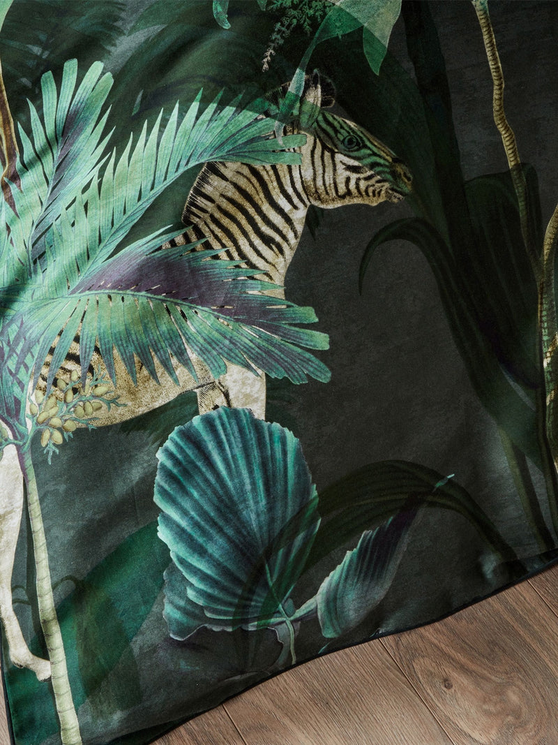 Riva Paoletti Green Siona Tropical reversible duvet cover and pillowcase set, imported from the UK