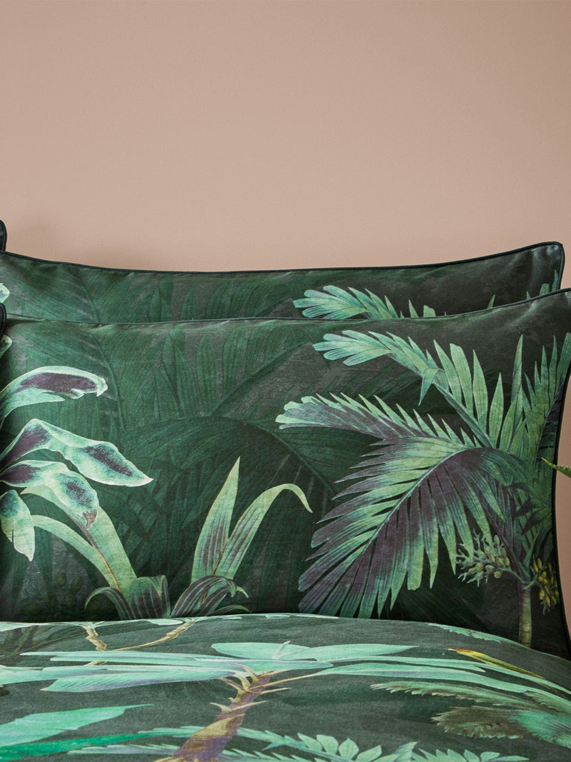 Riva Paoletti Green Siona Tropical reversible duvet cover and pillowcase set, imported from the UK