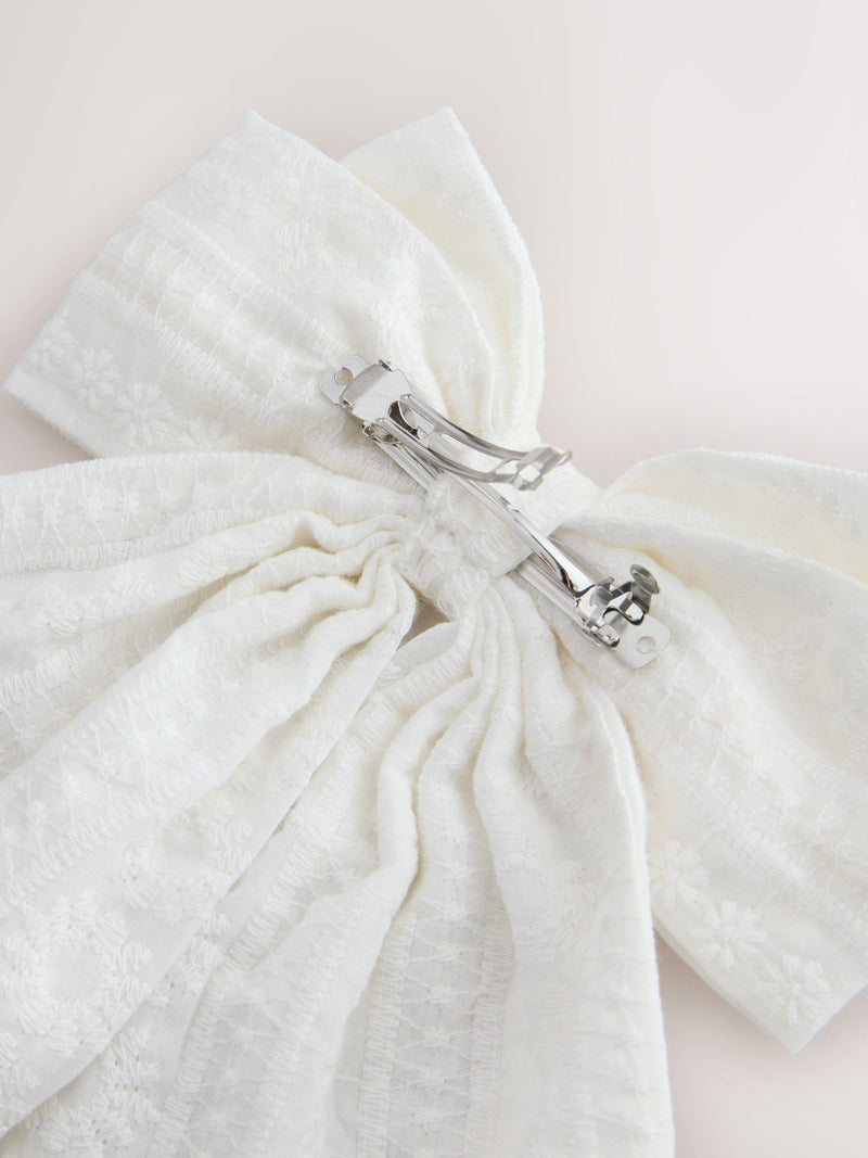 White broderie headband with large bow, UK version