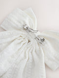 White broderie headband with large bow, UK version