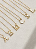 Inicio gold-plated mother of pearl C pendant necklace, UK version