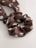 Polka dot scrunchie with tie detail in brown, UK version