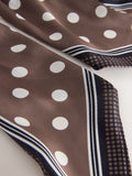 Polka dot scrunchie with tie detail in brown, UK version