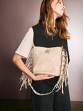 Rockett St George stone star studded tassel PU bucket bag, UK version
