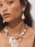 Gold tone shell drop earrings with gemstone accents (British brand)