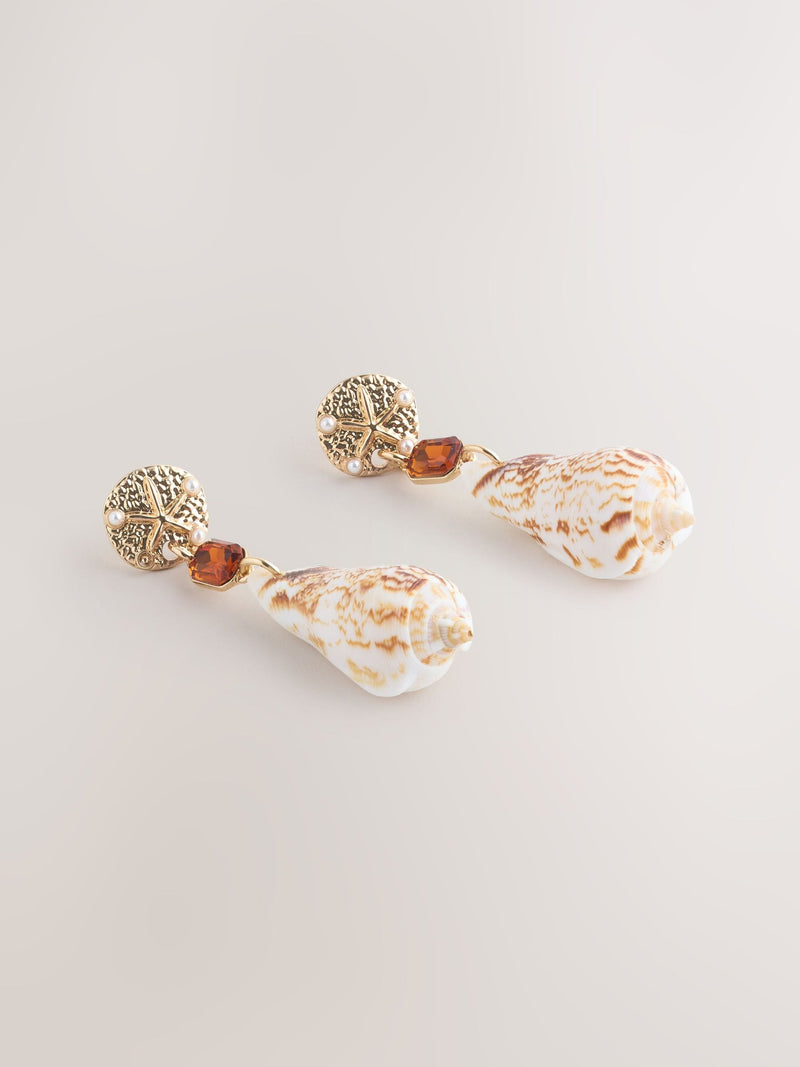 Gold tone shell drop earrings with gemstone accents (British brand)