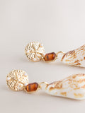 Gold tone shell drop earrings with gemstone accents (British brand)