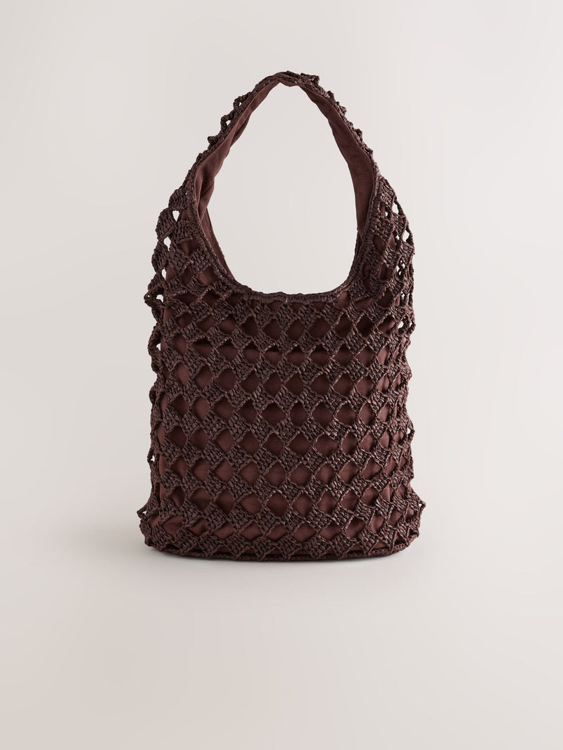 Chocolate brown crochet shoulder bag with shell charms - British product