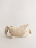 Natural sling cross body bag, imported from the UK