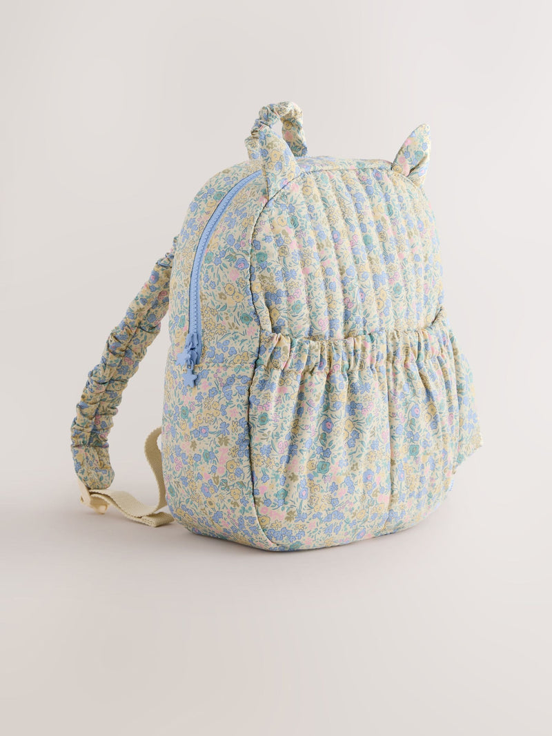 Floral blue ditsy cat backpack with quilted texture - British product