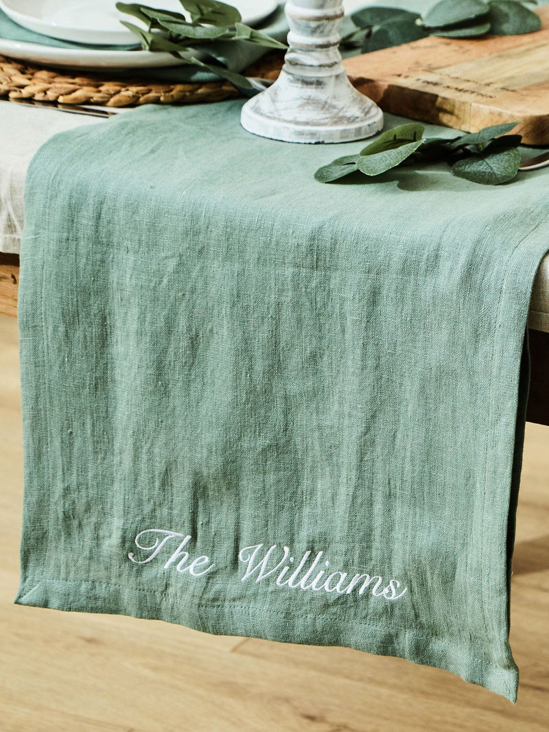 Made Yours Green personalised linen table runner in rosemary green, UK version