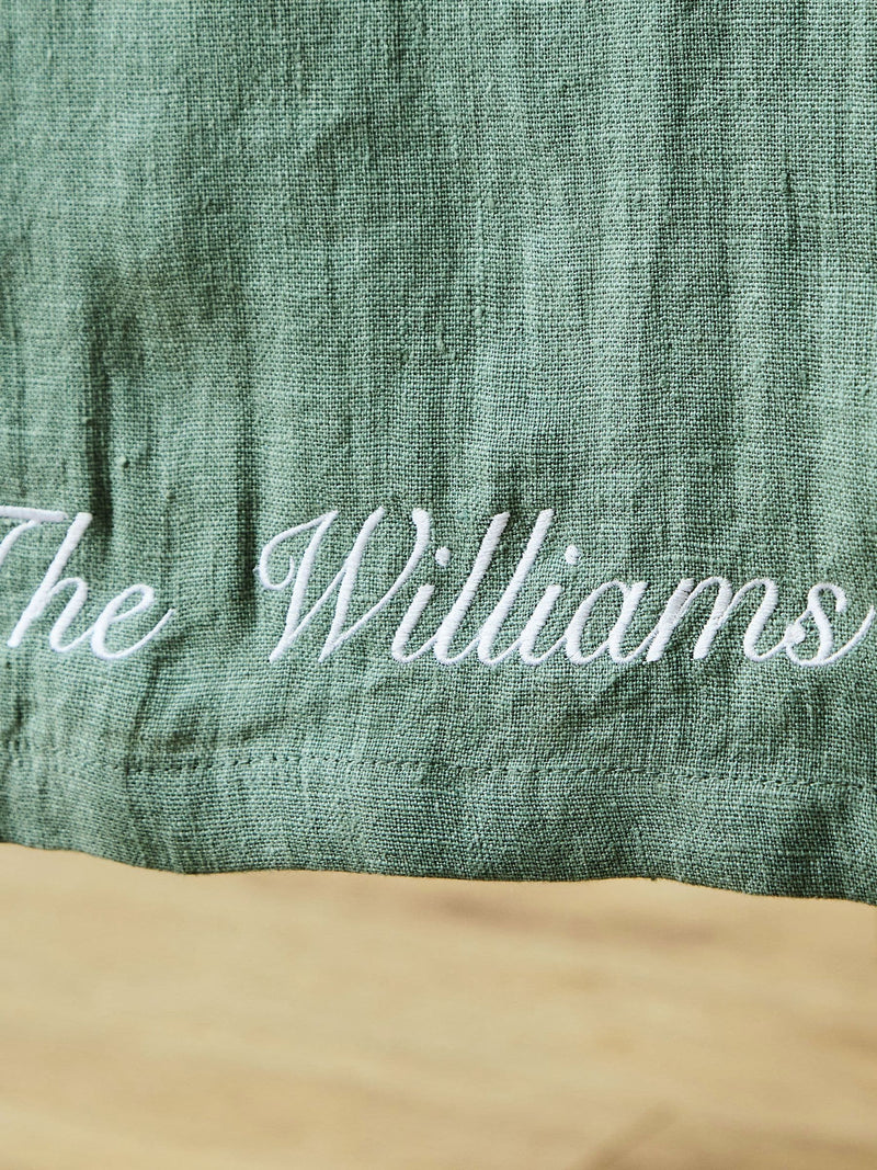 Made Yours Green personalised linen table runner in rosemary green, UK version