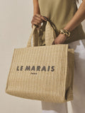 Canvas shoulder bag with raffia effect and Parisian embroidery (British brand)