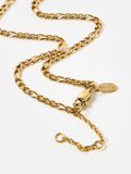 Oliver Bonas gold tone etched disc pendant necklace, imported from the UK