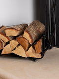 Snug black hazel log holder and fireside companion set (British brand)