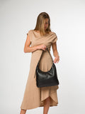 Cultured London black leather shoulder bag with silver fittings - British product