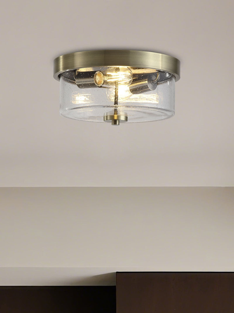 Searchlight antique brass seeded glass flush ceiling light, UK version