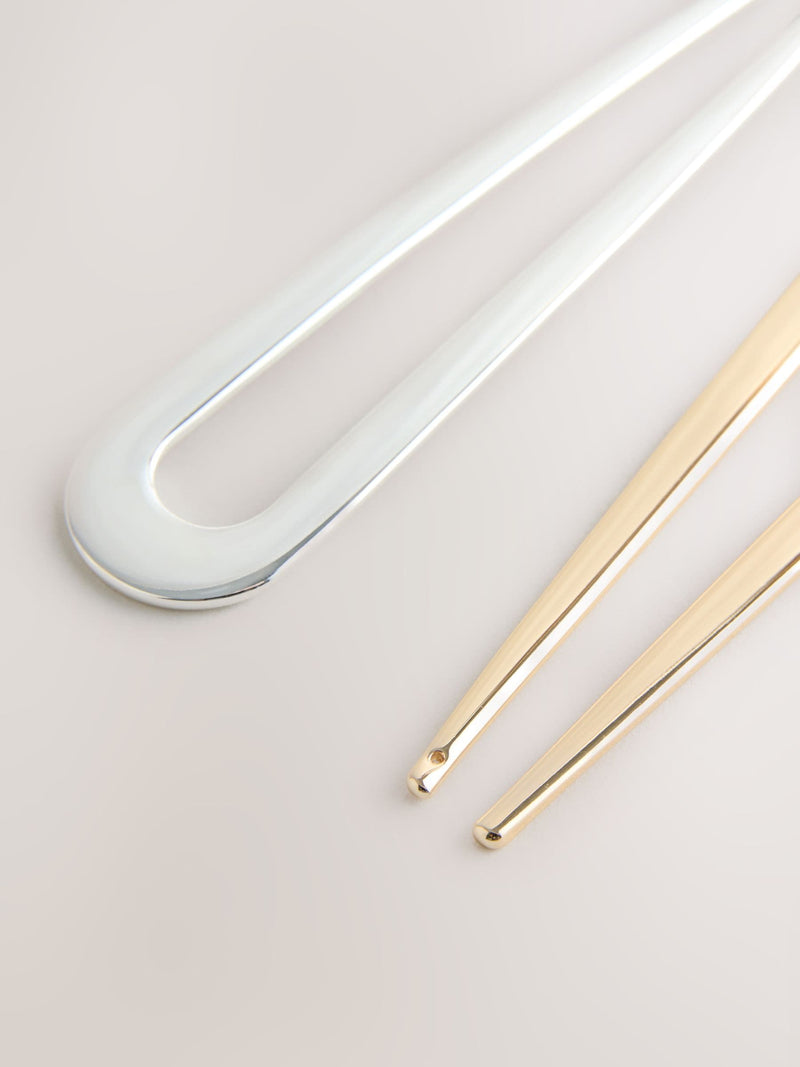 Set of two hair pins in gold and silver tones - British product