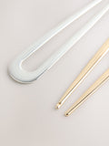 Set of two hair pins in gold and silver tones - British product