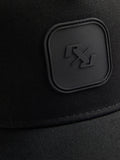 River Island black baseball cap with rubber logo badge, imported from the UK