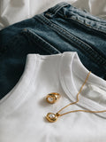 Orelia London gold tone molten pearl necklace, imported from the UK