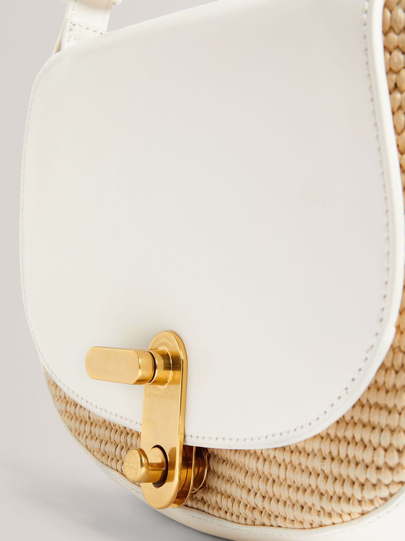 Ted Baker cream shoulder bag with twist lock and raffia trim, UK version