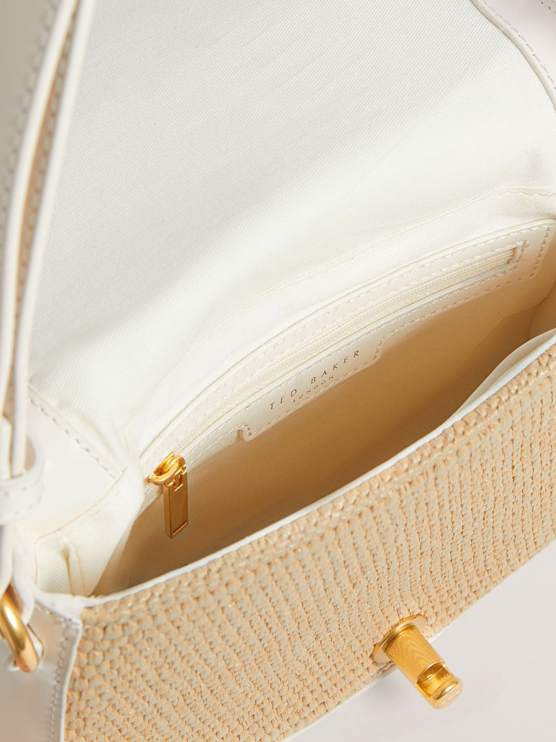 Ted Baker cream shoulder bag with twist lock and raffia trim, UK version