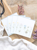 Next Something Different White Floral Glass Coaster Set- Buy online at McGrocer