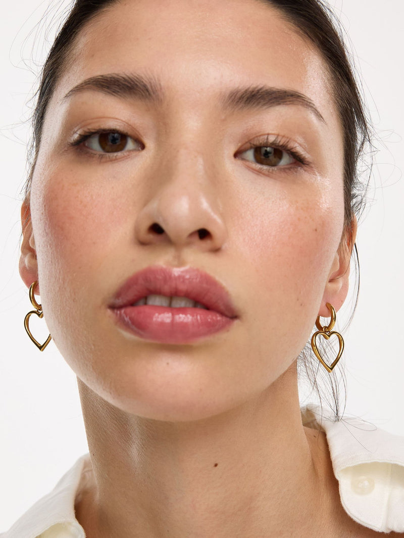 Oliver Bonas gold tone Danica heart drop earrings - British product