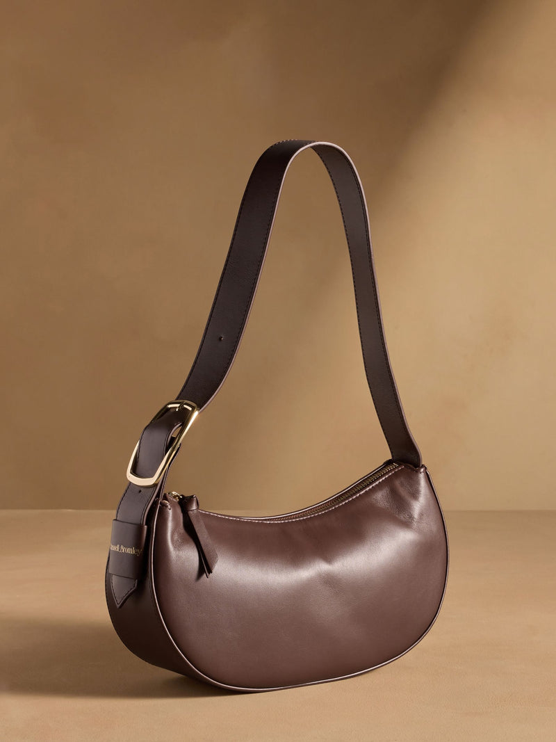 Russell & Bromley Sutton small oval shoulder bag brown (British brand)