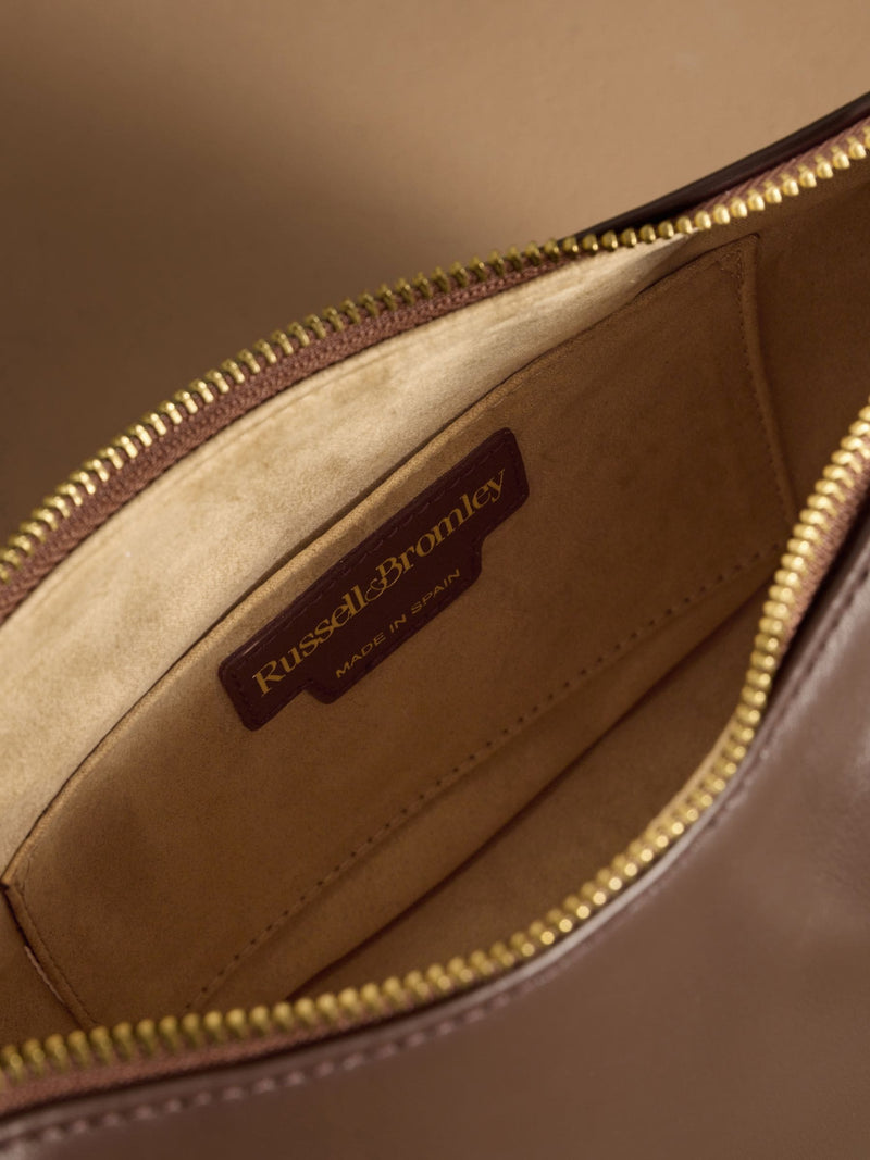 Russell & Bromley Sutton small oval shoulder bag brown (British brand)