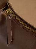 Russell & Bromley Sutton small oval shoulder bag brown (British brand)