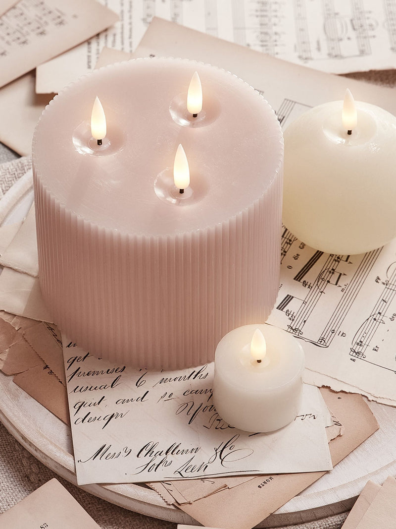 Lights4fun blush pink TruGlow LED candle 10cm, imported from the UK