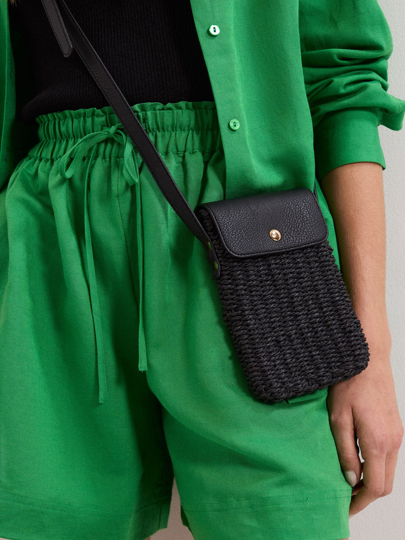Phase Eight black straw cross-body phone case, imported from the UK