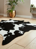 Think Rugs faux cow rug black faux fur, imported from the UK