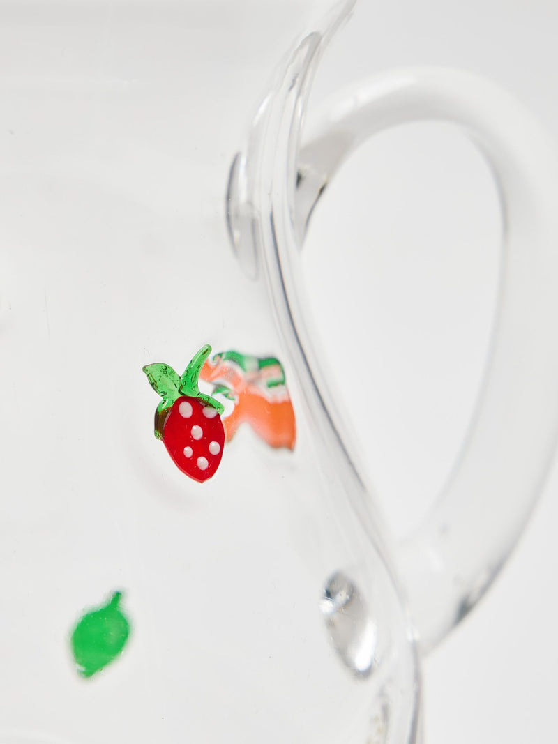 Oliver Bonas clear glass cocktail jug with fruit motifs, imported from the UK