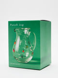 Oliver Bonas clear glass cocktail jug with fruit motifs, imported from the UK