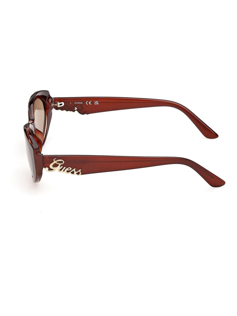 Guess brown injected sunglasses with oval shape and Guess logo - British product