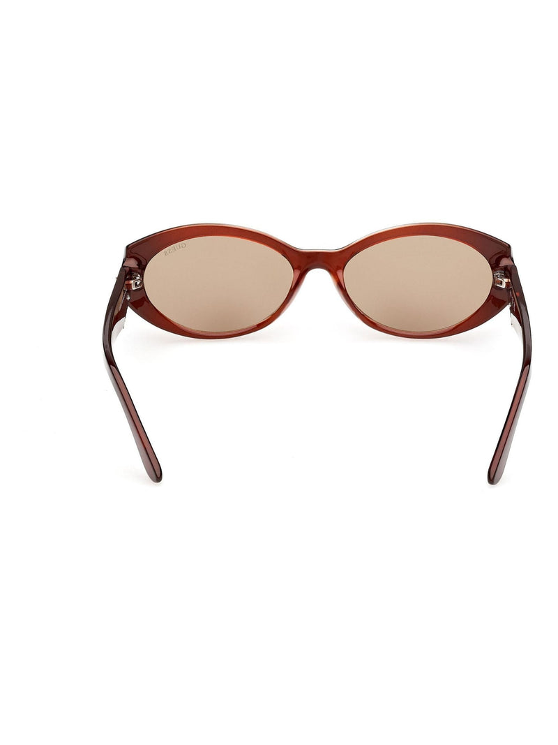 Guess brown injected sunglasses with oval shape and Guess logo - British product