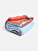 Next Oliver Bonas Blue Rust Reversible Velvet Frill Quilt- Buy online at McGrocer