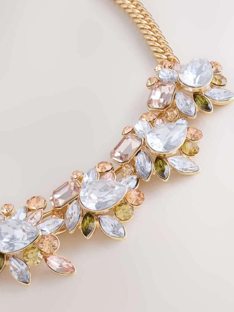 Gold tone collar necklace with pink sparkle and gemstones - British product