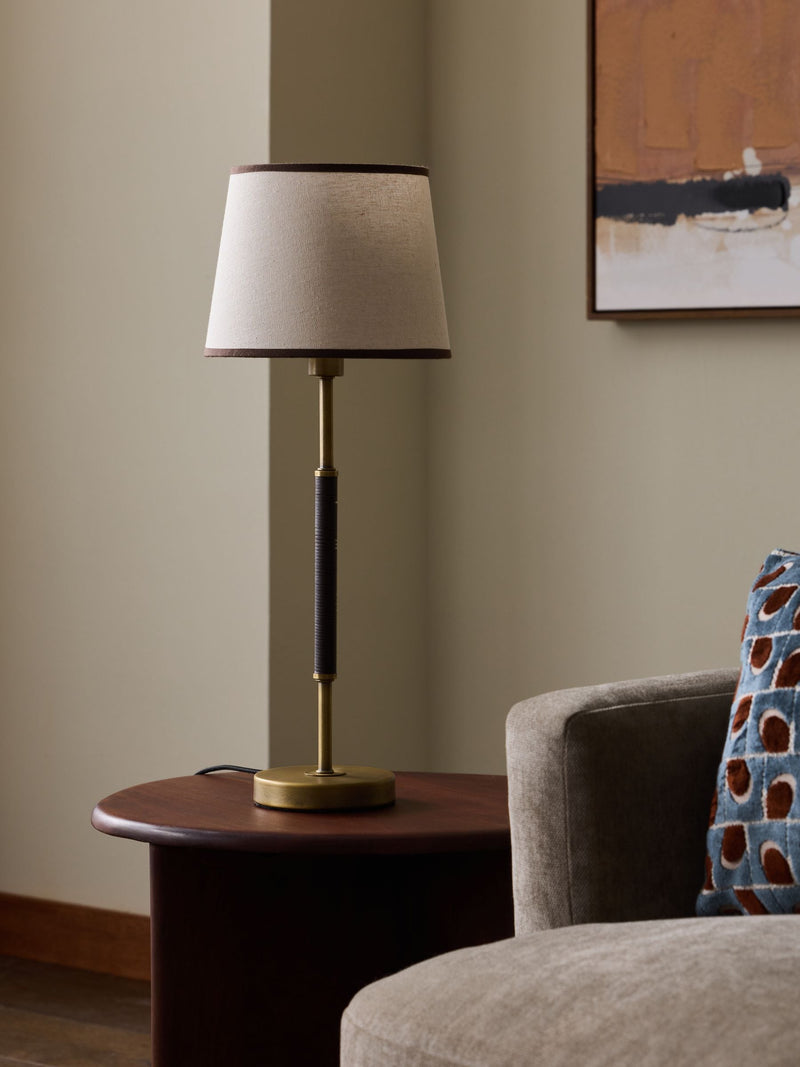 Brass Bentham table lamp with faux leather base and fabric shade - British product
