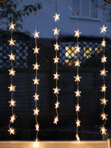 Next Lights4fun 40 Warm White LED Star Curtain Light- Buy online at McGrocer